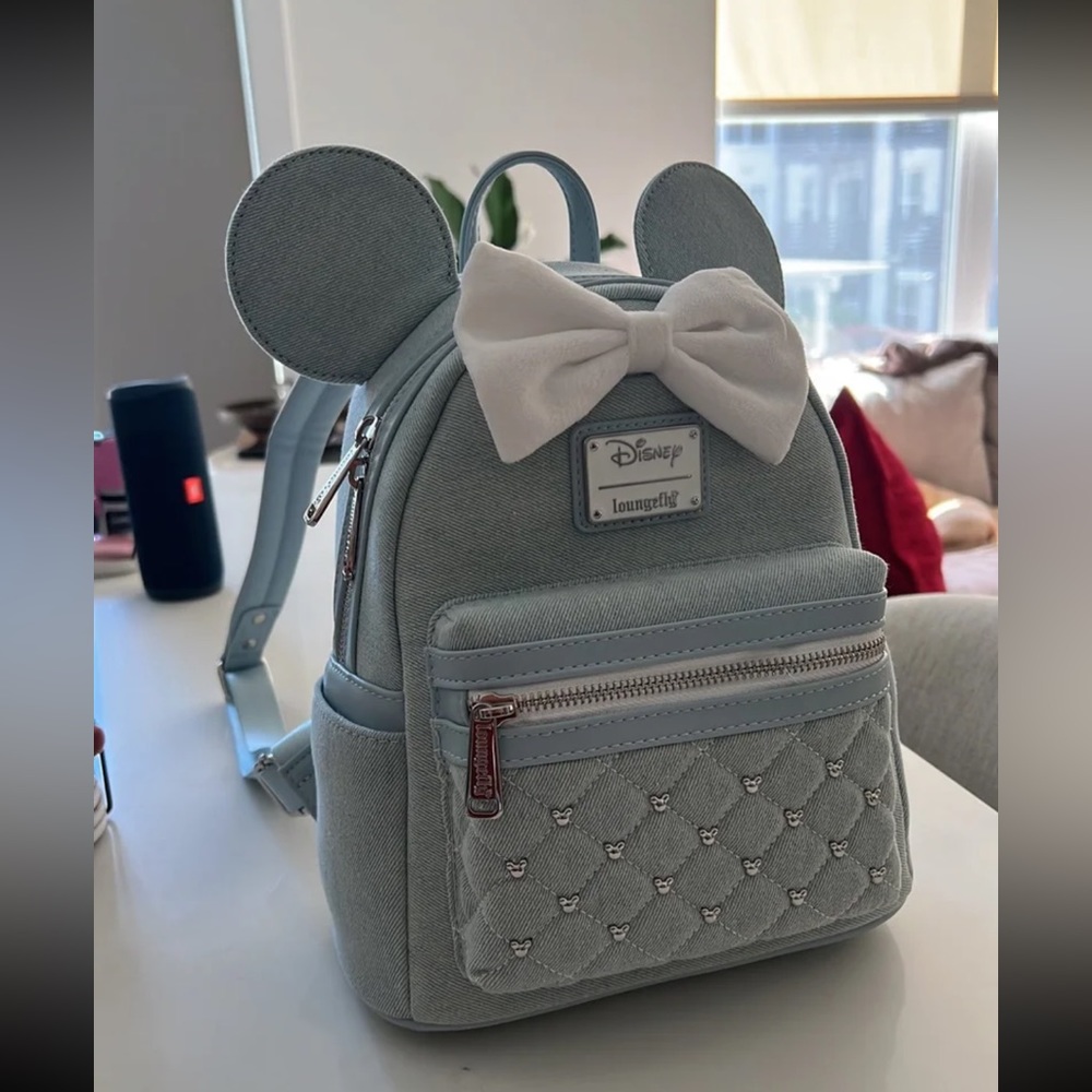 Disney Loungefly backpack light blue with white bow, brand new, never been used
